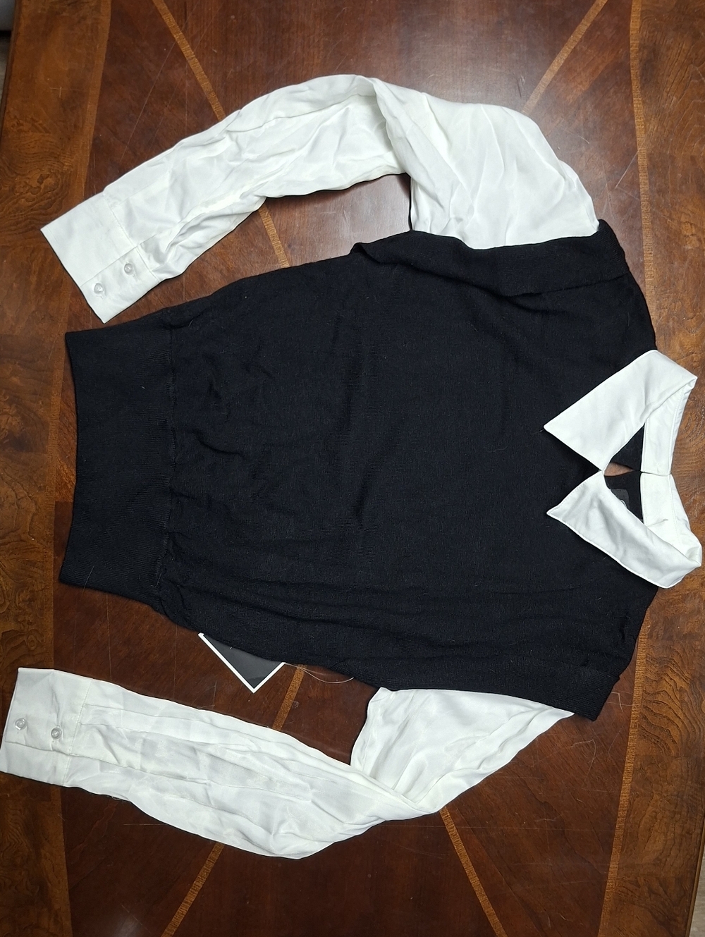 Black Sweater Vest with White Shirt Collar and Sleeves